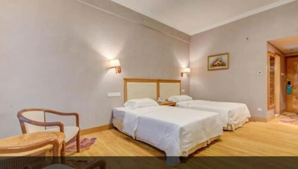 Bed in Zhuhai Dehan Hotel