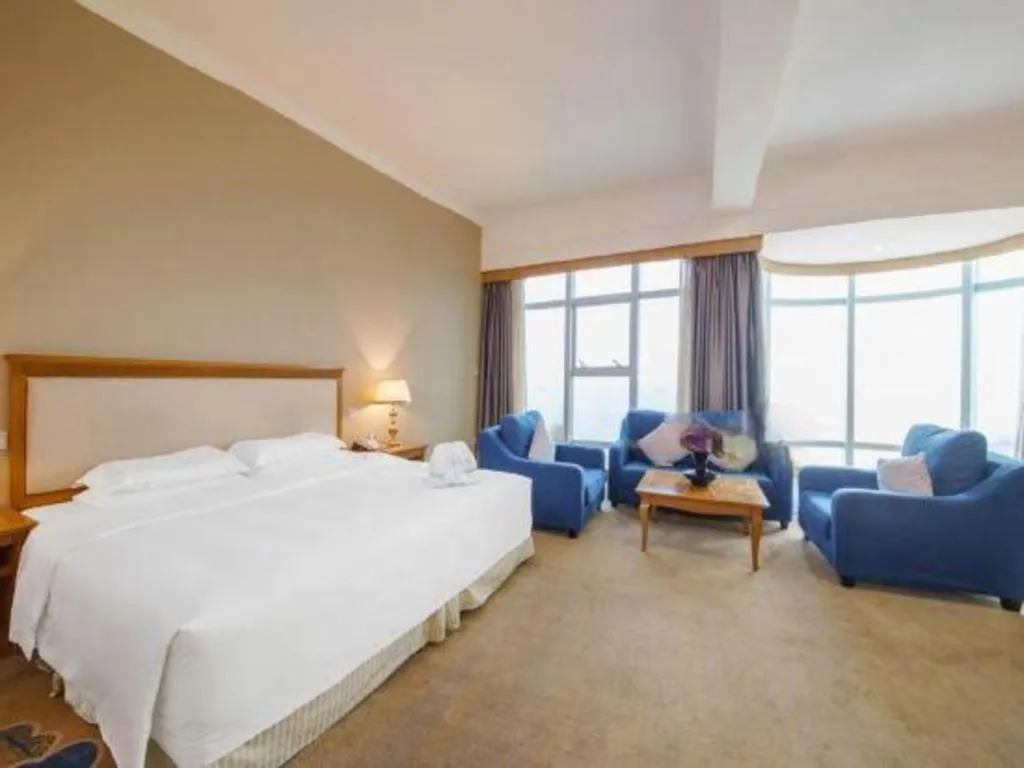 Bed in Zhuhai Dehan Hotel