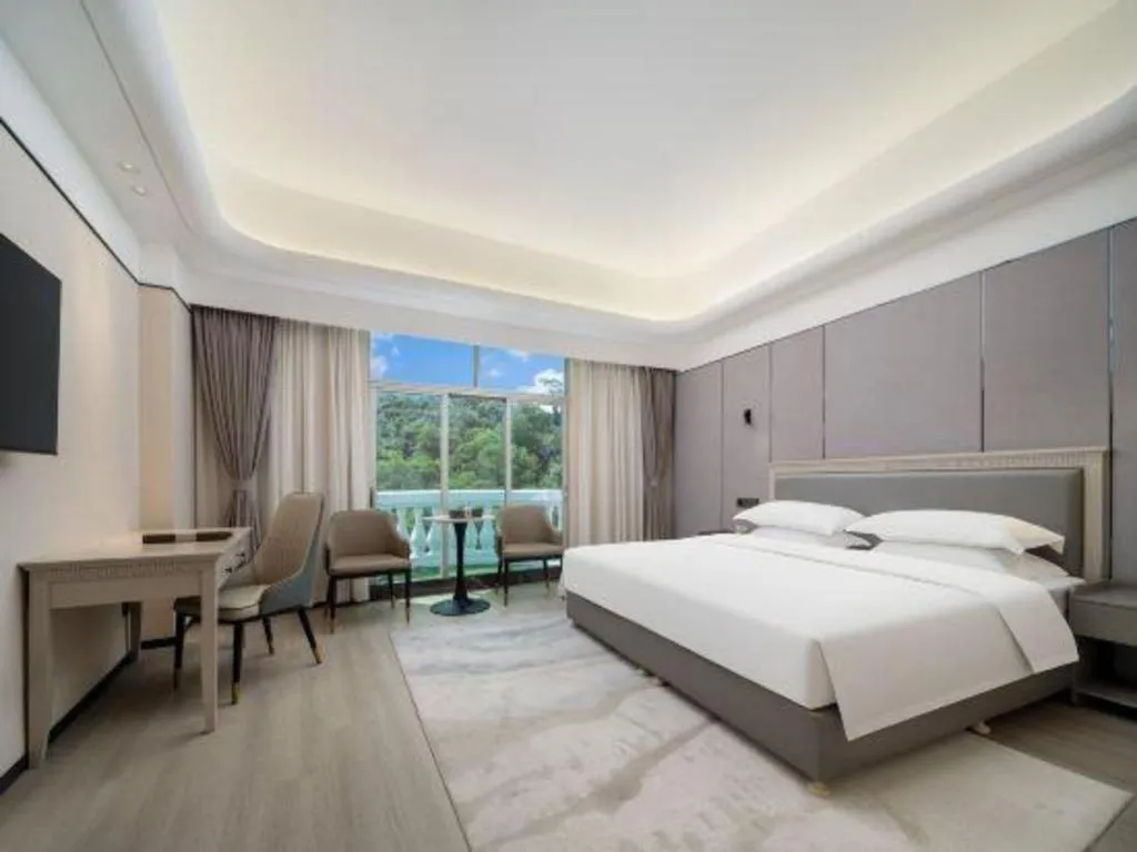 Bed in Zhuhai Dehan Hotel