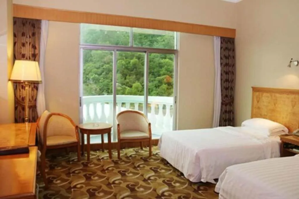 Bed in Zhuhai Dehan Hotel