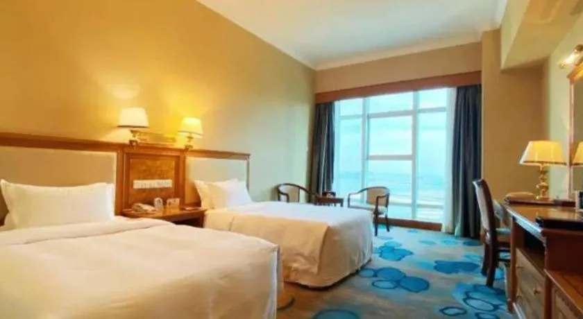 Bed in Zhuhai Dehan Hotel