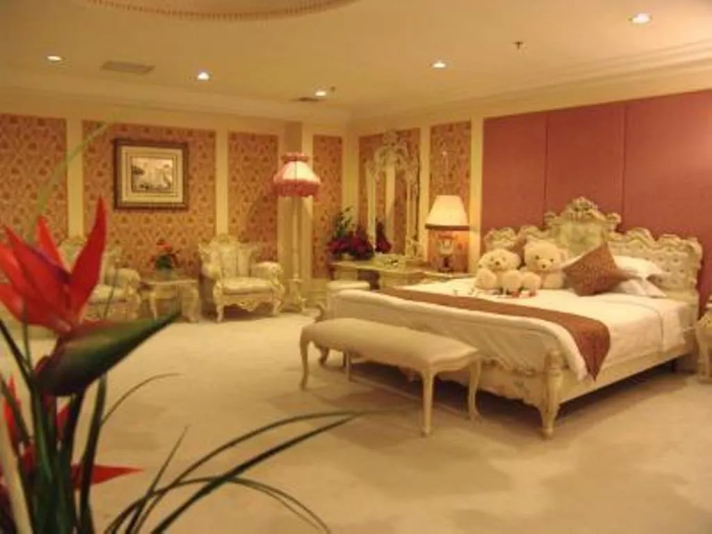 Bed in Zhuhai Dehan Hotel