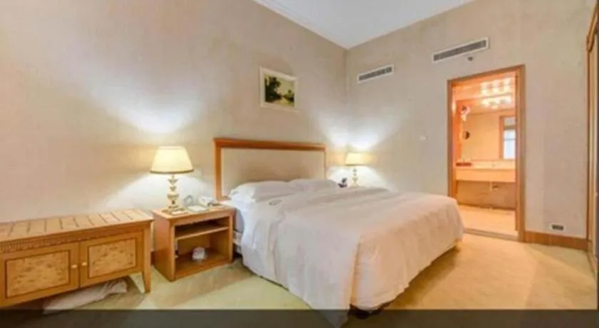 Bed in Zhuhai Dehan Hotel