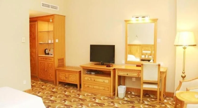 Bed in Zhuhai Dehan Hotel