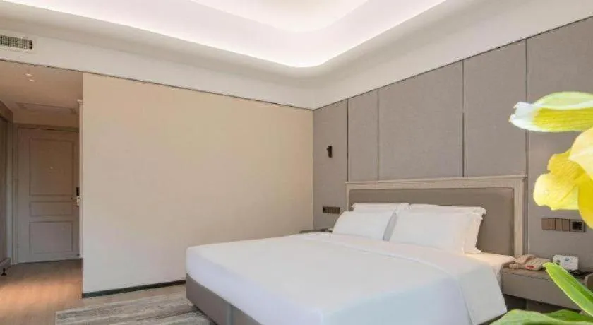 Bed in Zhuhai Dehan Hotel