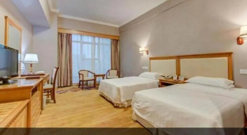 Bed in Zhuhai Dehan Hotel