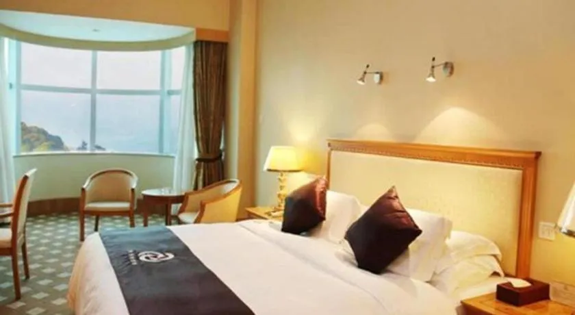 Bed in Zhuhai Dehan Hotel
