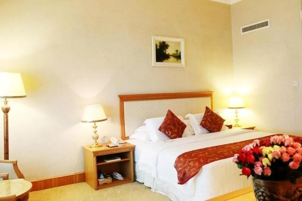 Bed in Zhuhai Dehan Hotel