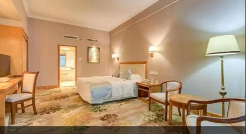 Bed in Zhuhai Dehan Hotel