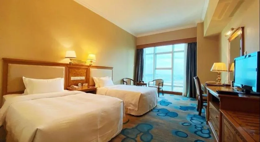 Bed in Zhuhai Dehan Hotel