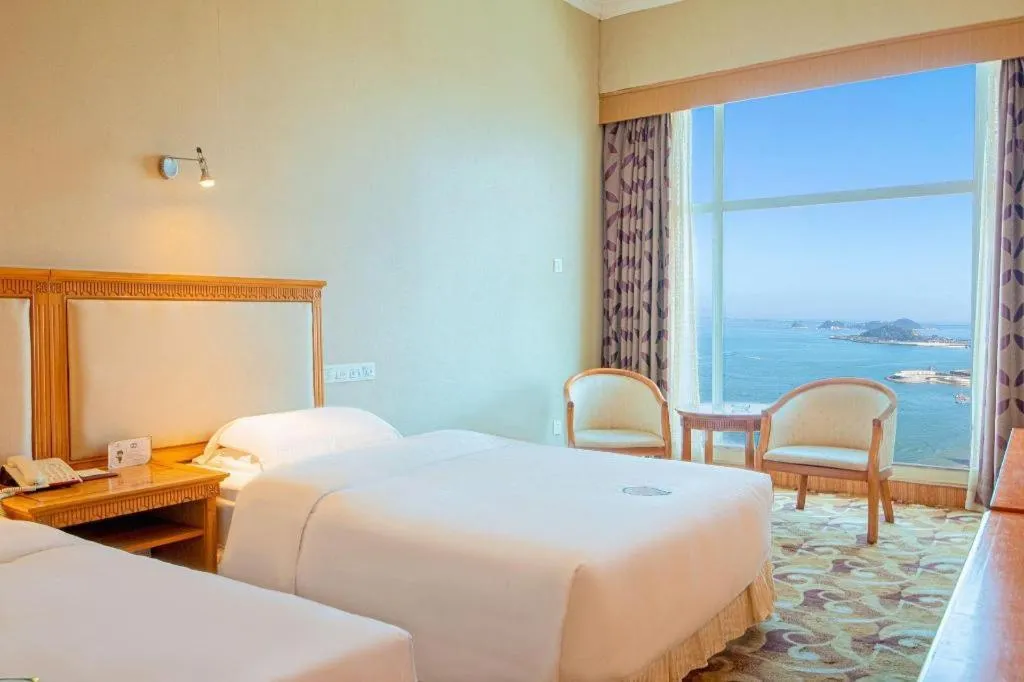 Bed in Zhuhai Dehan Hotel