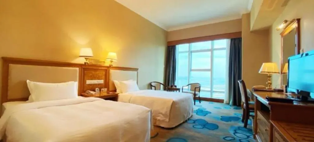 Bed in Zhuhai Dehan Hotel
