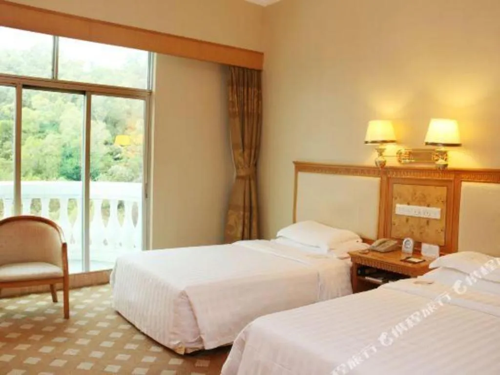 Bed in Zhuhai Dehan Hotel