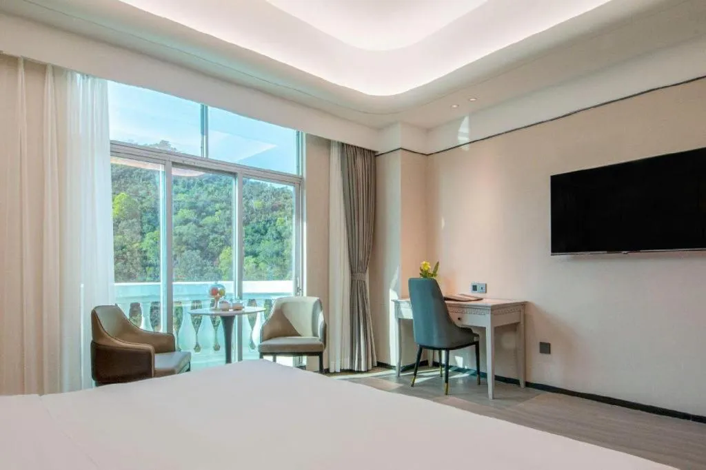 Bed in Zhuhai Dehan Hotel