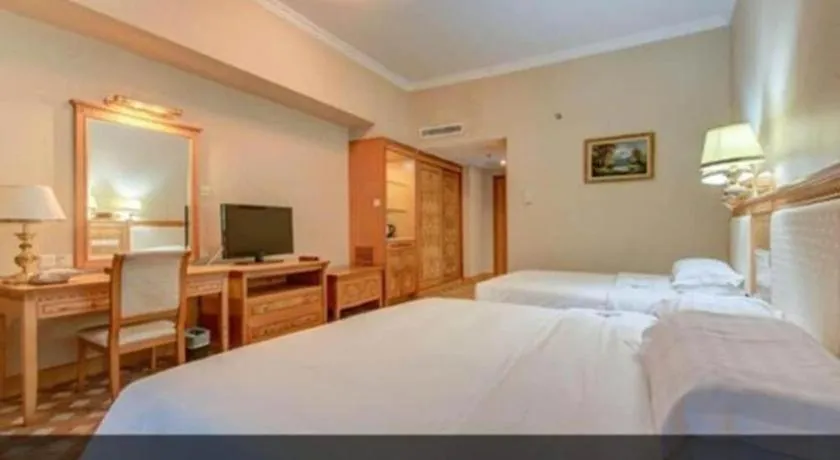 Bed in Zhuhai Dehan Hotel