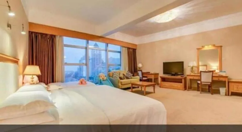Bed in Zhuhai Dehan Hotel