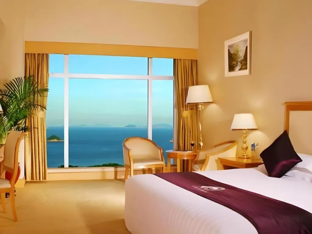 Bed in Zhuhai Dehan Hotel