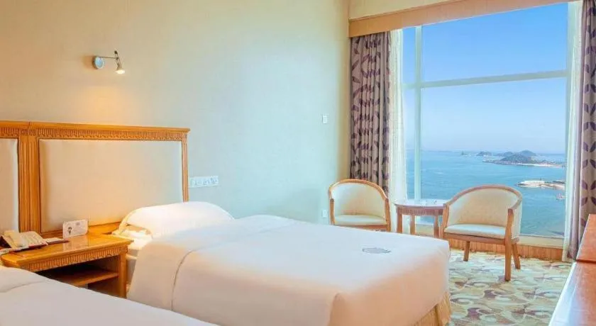 Bed in Zhuhai Dehan Hotel