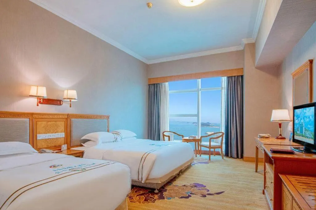 Bed in Zhuhai Dehan Hotel
