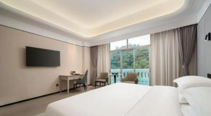 Bed in Zhuhai Dehan Hotel