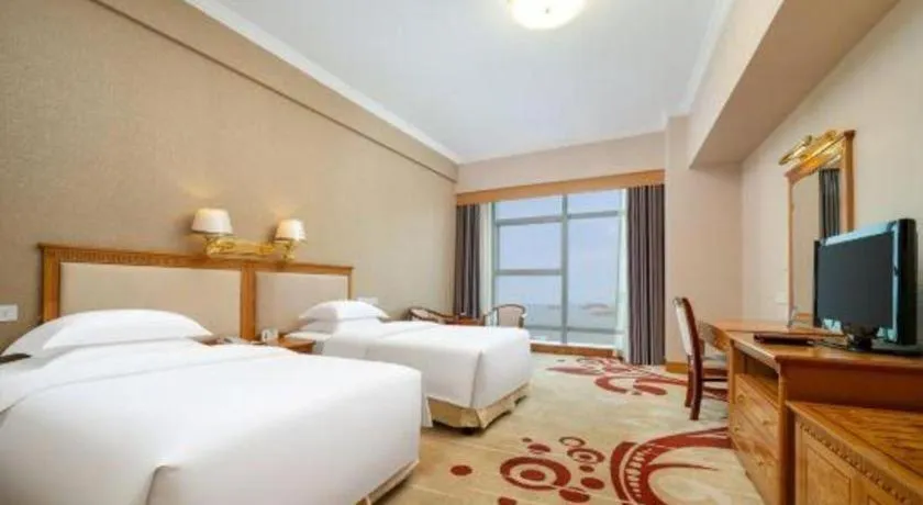 Bed in Zhuhai Dehan Hotel