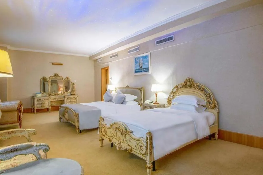 Bed in Zhuhai Dehan Hotel