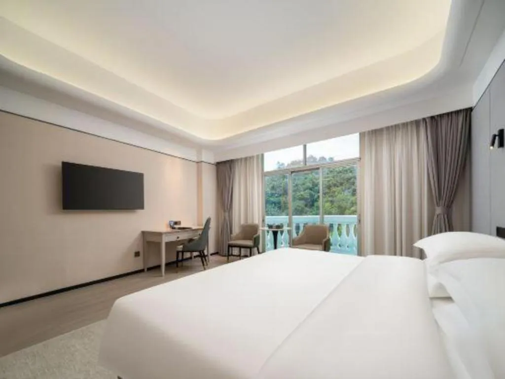 Bed in Zhuhai Dehan Hotel