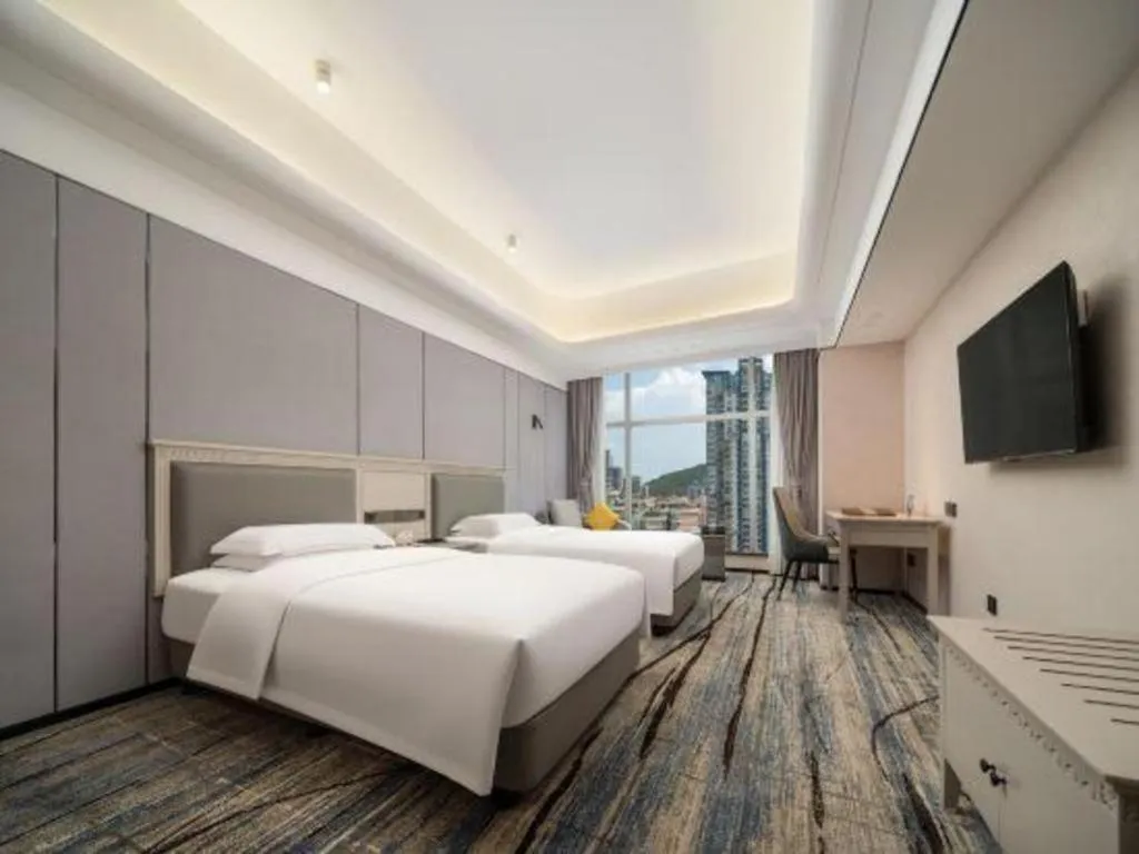 Bed in Zhuhai Dehan Hotel