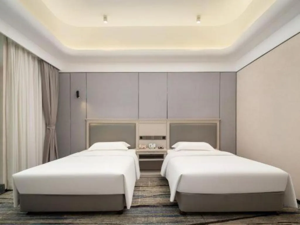 Bed in Zhuhai Dehan Hotel