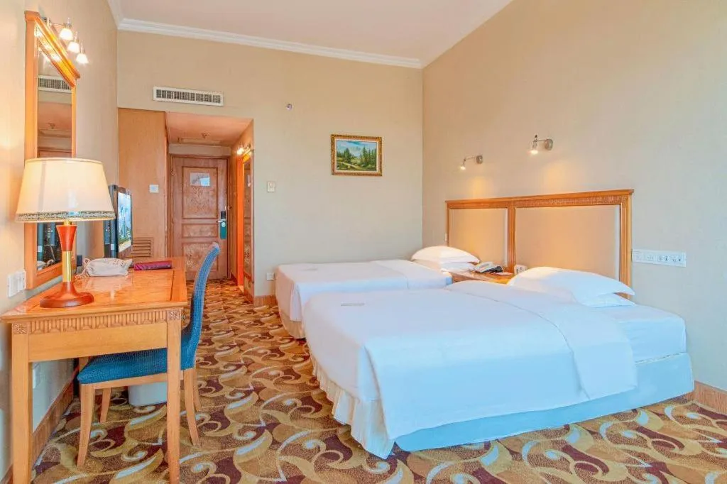 Bed in Zhuhai Dehan Hotel