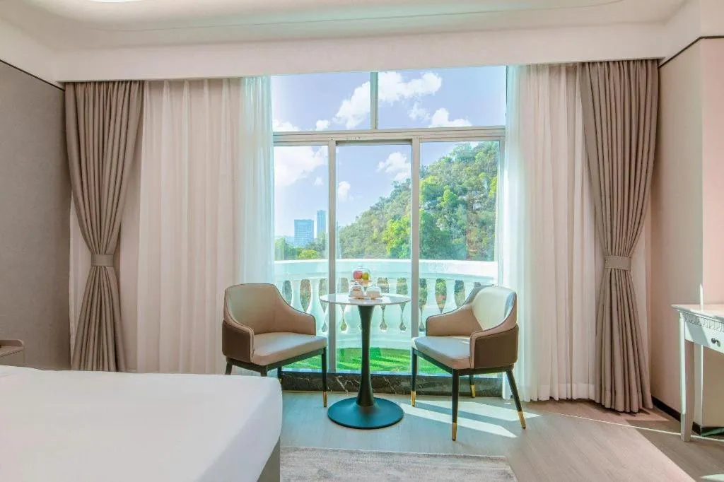 Bed in Zhuhai Dehan Hotel