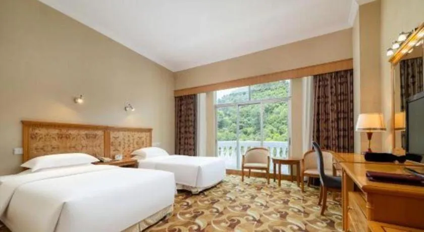 Bed in Zhuhai Dehan Hotel