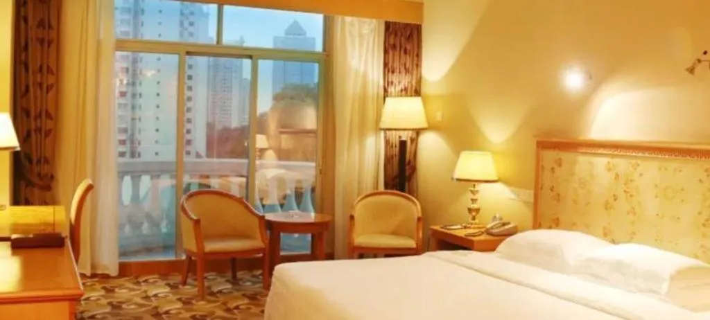 Bed in Zhuhai Dehan Hotel