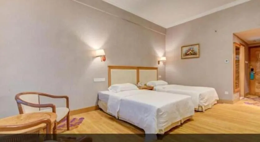 Bed in Zhuhai Dehan Hotel