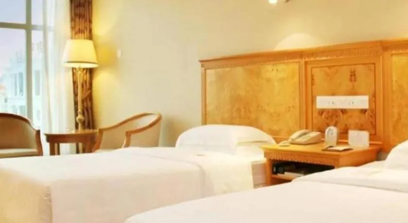 Bed in Zhuhai Dehan Hotel