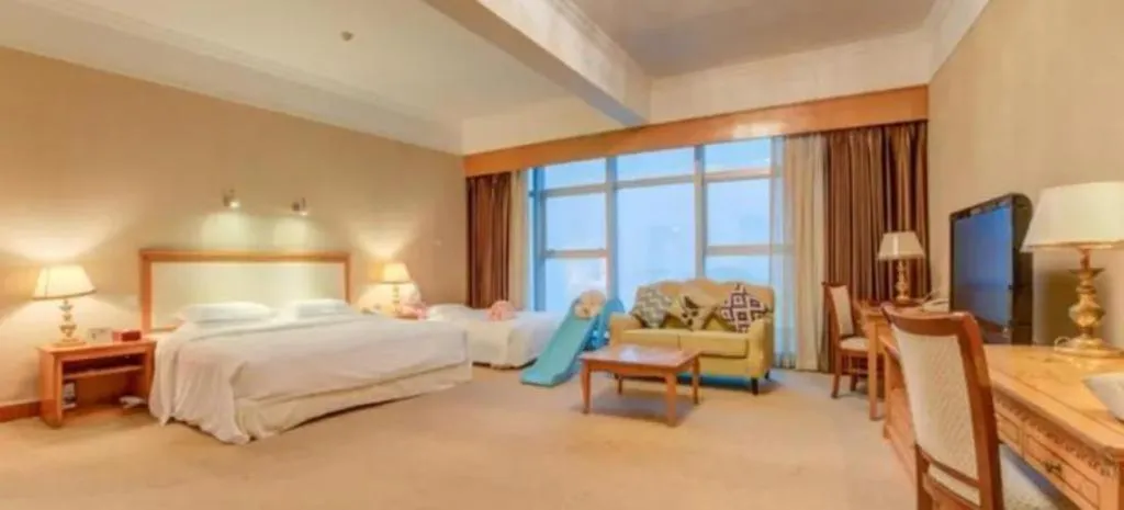 Bed in Zhuhai Dehan Hotel