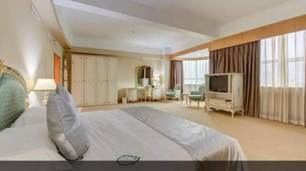 Bed in Zhuhai Dehan Hotel
