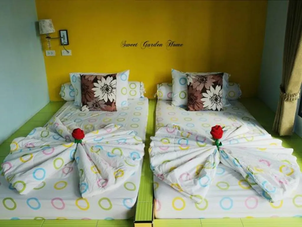 Bed in Sweet Garden Home Resort