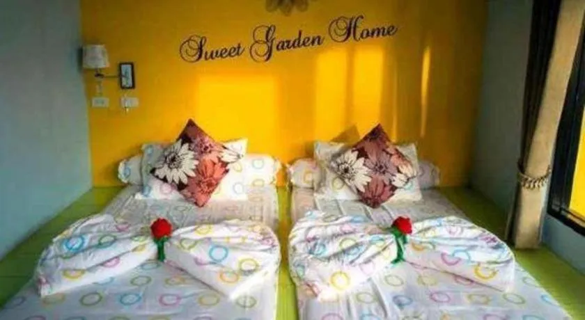Bed in Sweet Garden Home Resort