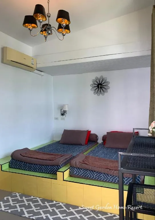 Bed in Sweet Garden Home Resort