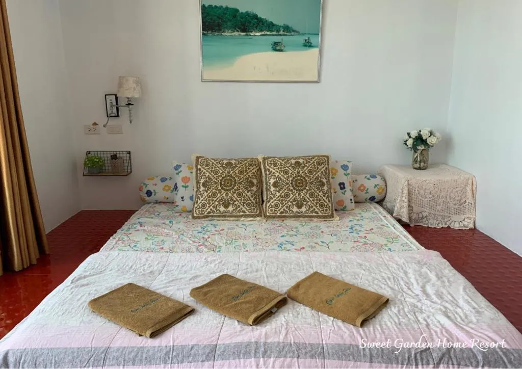 Bed in Sweet Garden Home Resort