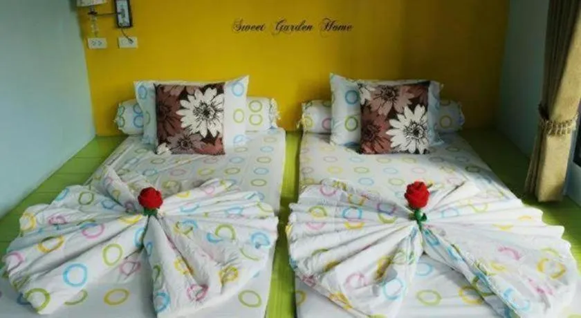 Bed in Sweet Garden Home Resort