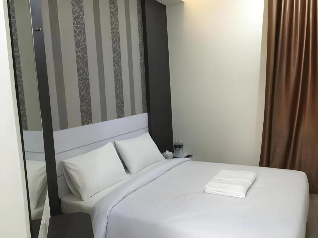 Bed in Redlink Hotel