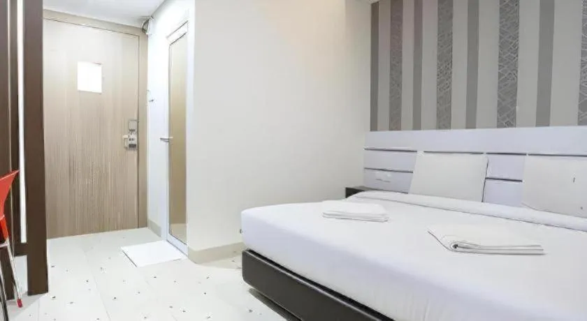 Bed in Redlink Hotel