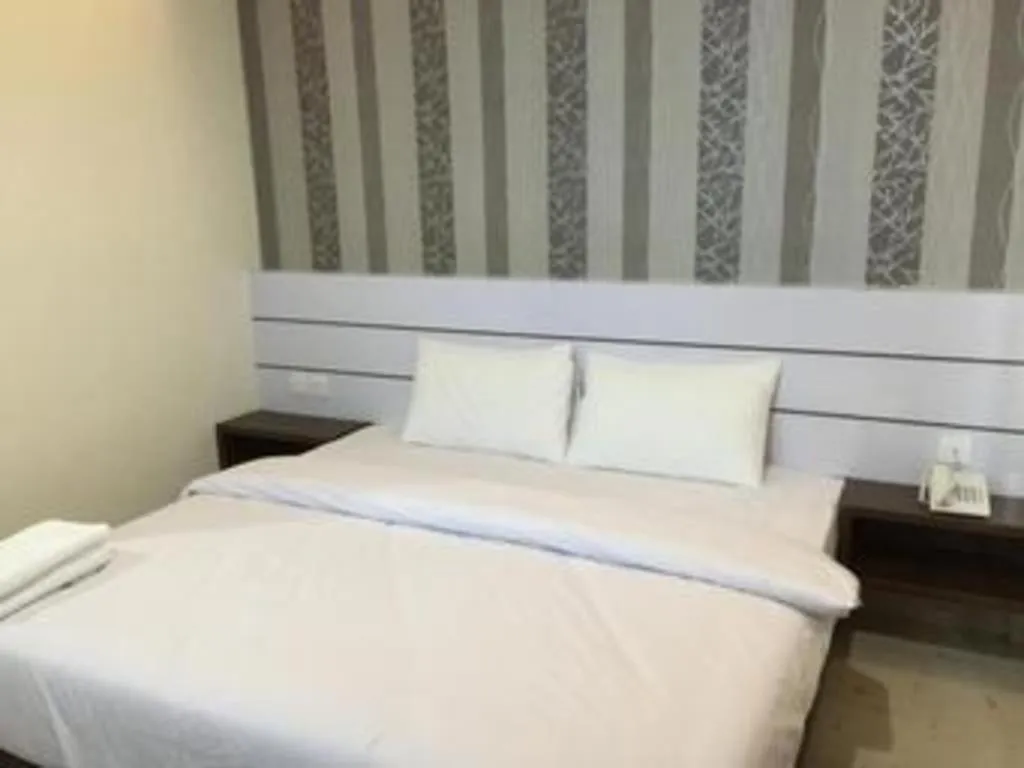 Bed in Redlink Hotel