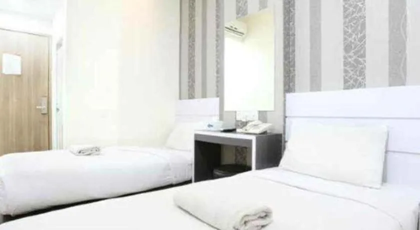 Bed in Redlink Hotel