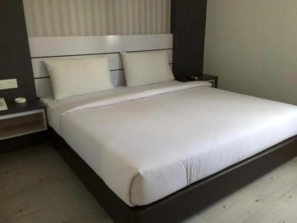 Bed in Redlink Hotel