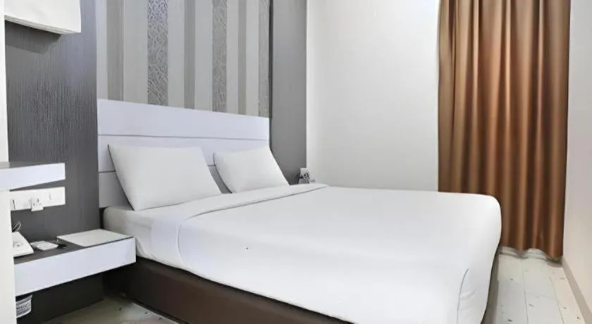 Bed in Redlink Hotel