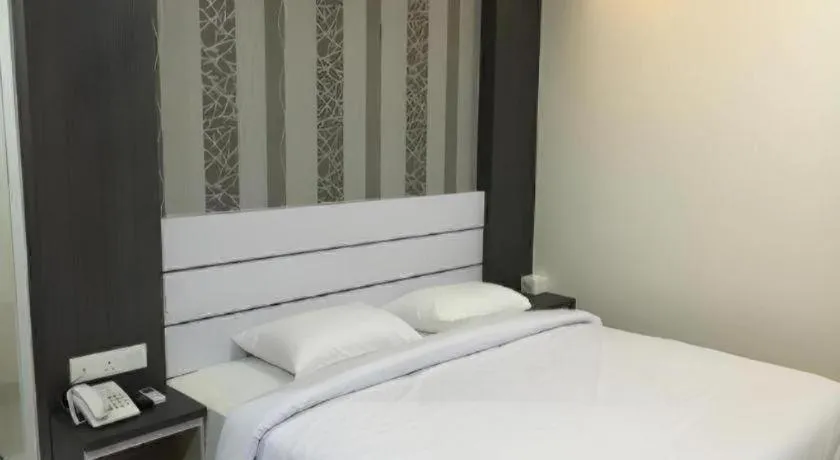 Bed in Redlink Hotel