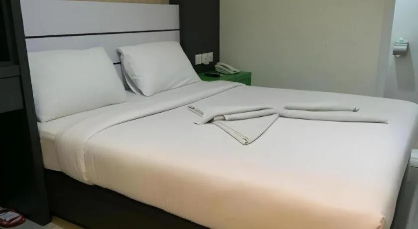 Bed in Redlink Hotel